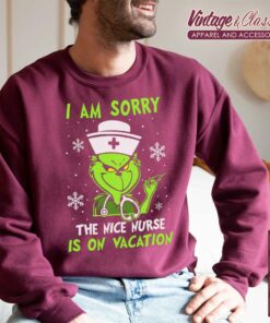 I Am Sorry The Nice Nurse Is On Vacation Christmas Shirt Grinch Nurse Sweatshirt 2