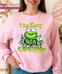I Am Sorry The Nice Nurse Is On Vacation Grinch Nurse Sweatshirt pink