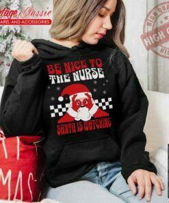 Nurse Christmas Shirt Be Nice To The Nurse Santa Is Watching Hoodie